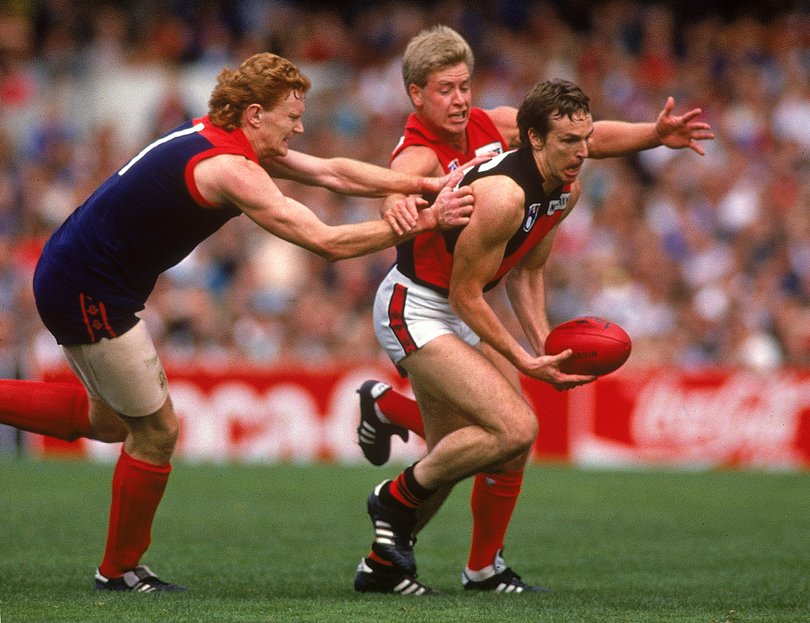 Daniherin action for Essendon against Melbourne in 1990 at the Melbourne Cricket Ground.