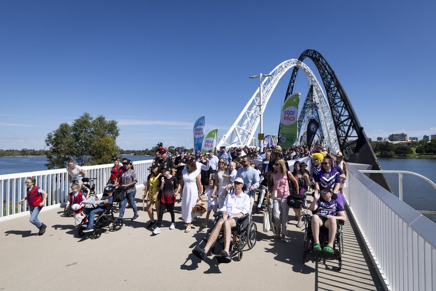 Neale Daniher is seen along with family during the Hand In Hand Crossing for Inclusion in East Perth in 2025.