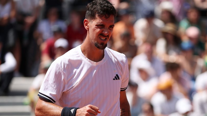 Thanasi Kokkinakis has pulled off a win in another of his five-set Roland Garros epics.