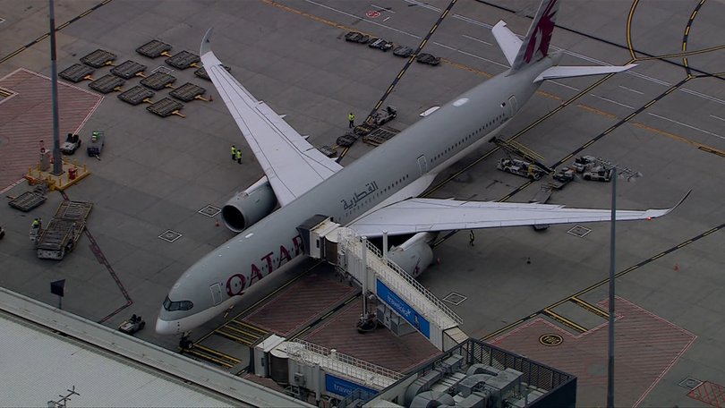 A Qatar Airways plane arrives at Melbourne airport carrying ‘ISIS brides’ and their children.
PICTURE: 7NEWS