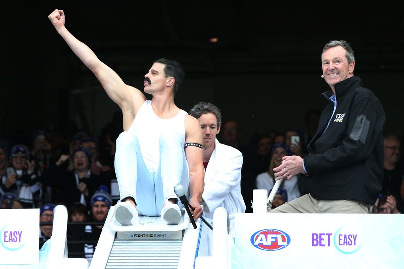 Nick Riewoldt going down the Big Freeze slide as Freddie Mercury in 2019.