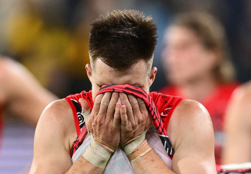 Zach Merrett of the Bombers looks dejected after losing the round 11 AFL match between Richmond Tigers and Essendon Bombers.