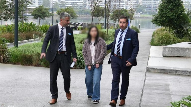 Police have charged a woman for her alleged involvement in a multimillion-dollar fraud syndicate. 