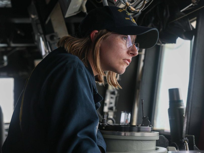 A US Sailor stands watch in the pilothouse aboard USS John Finn as the guided-missile destroyer transits the Arabian Sea in support of the US blockade against Iran. 