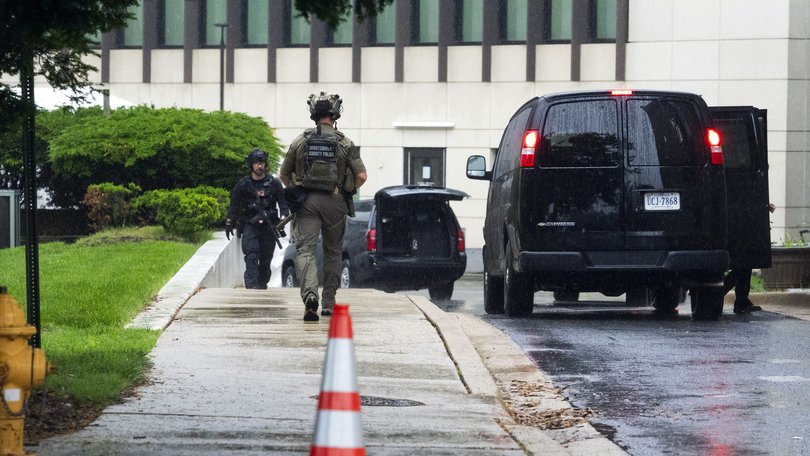 Montgomery County police and Secret Service security personnel on patrol as President Donald Trump undergoes a medical exam at the Walter Reed National Military Medical Center.