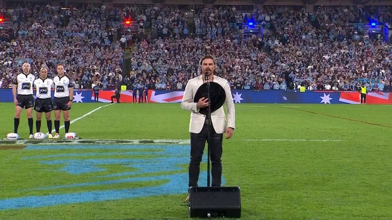 Robbie Mortimer has been torched by fans for his rendition of the national anthem.