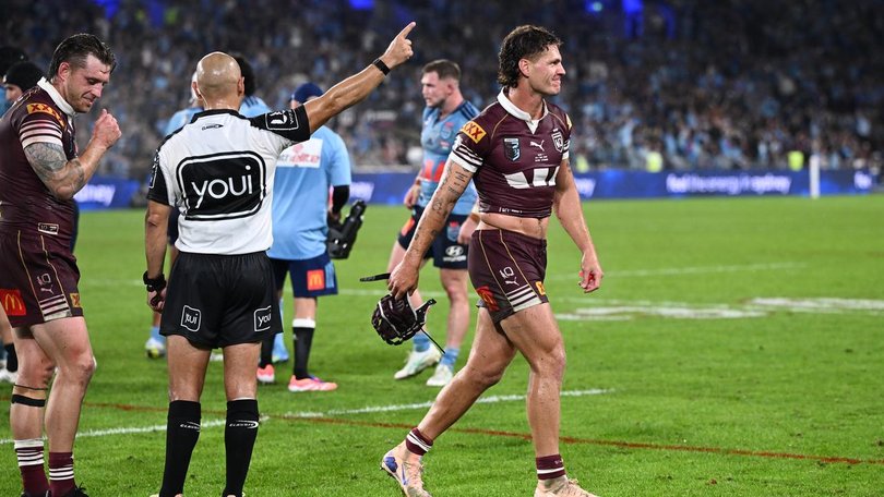 Maroon's Kalyn Ponga is sent off by referee Ashley Klein while Cameron Munster argues the call. 