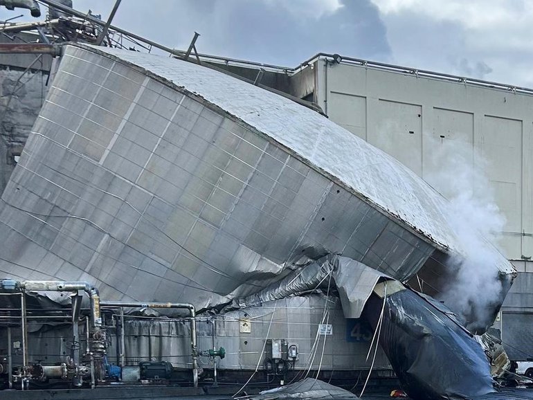 It's believed 11 people died after a tank ruptured at a paper mill, releasing 'white liquor'. 