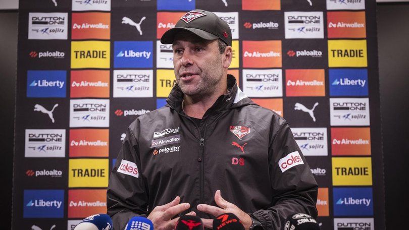 Ex-Essendon board member and current interim coach Dean Solomon won't consider the full-time job. 