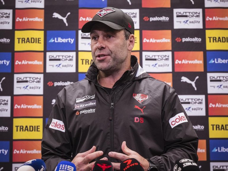 Ex-Essendon board member and current interim coach Dean Solomon won't consider the full-time job. 