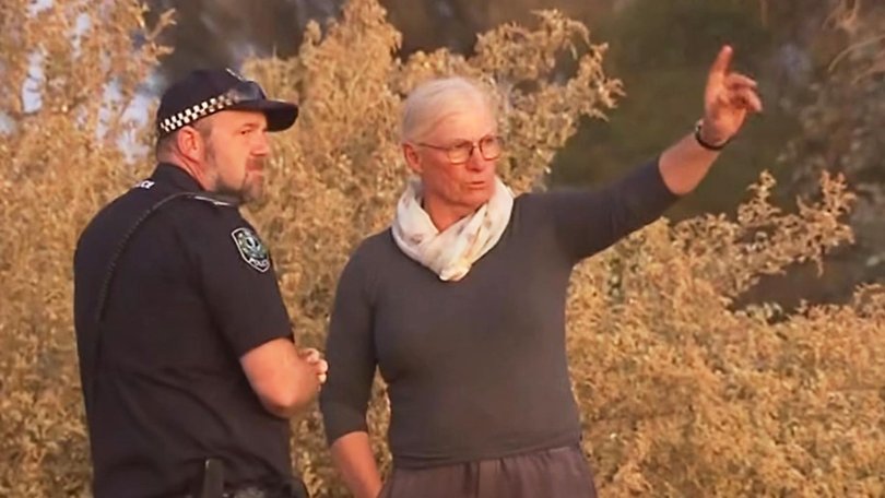 Police talk to Josie Murray during the search. Picture: 7NEWS Adelaide