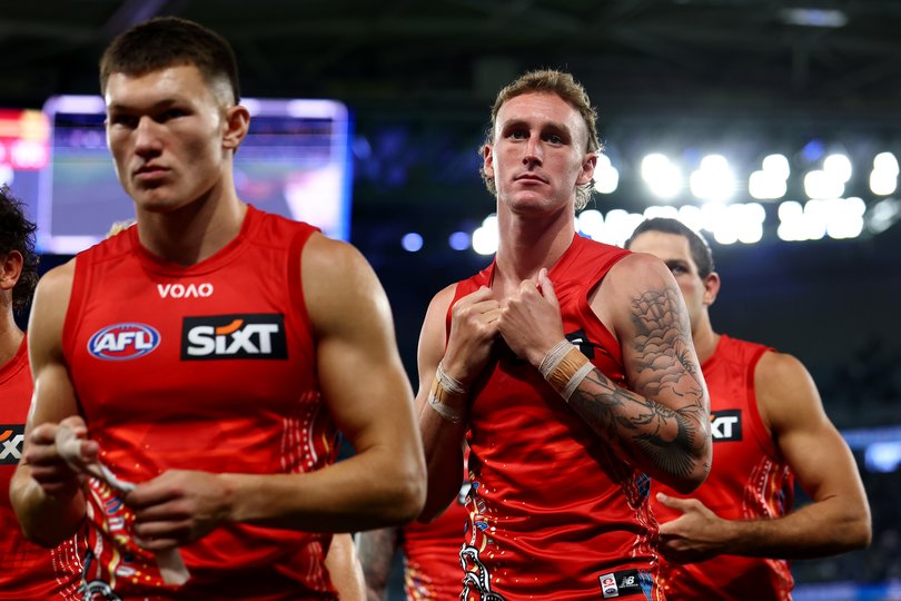Sam Clohesy of the Suns looks dejected after losing the round 11 AFL match.
