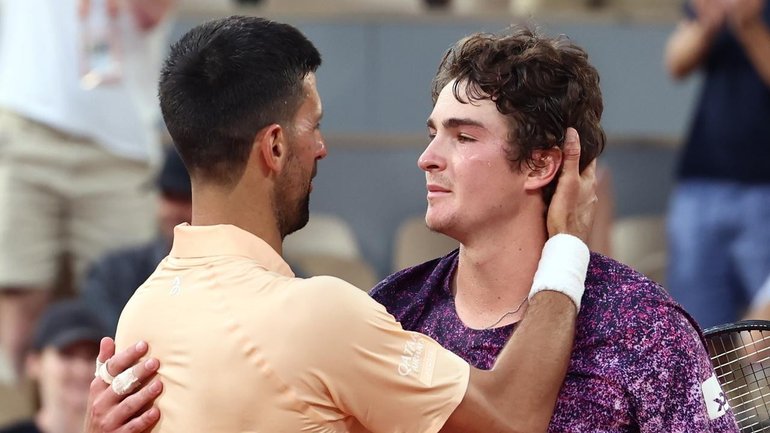 Novak Djokovic congratulates Joao Fonseca after the teen beat the veteran at Roland Garros. 