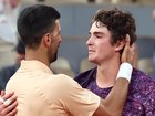 Novak Djokovic congratulates Joao Fonseca after the teen beat the veteran at Roland Garros. 