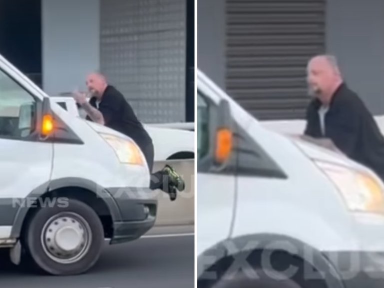 Road rage horror as man dangles from moving van.