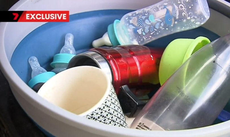 The family has to wash their dishes in the bath.