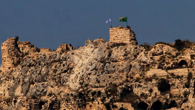 The Israeli flag and the flag of Golani Brigade flies over of the Crusader-era Beaufort Castle in southern Lebanon.