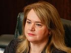 Madeleine Ogilvie resigned from Tasmania's cabinet after saying she wasn't party to any court cases. (Rob Blakers/AAP PHOTOS)