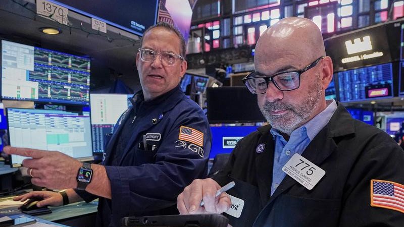 Wall Street traders have priced in a 70 per cent chance of a rate hike before the end of the year. (AP PHOTO)