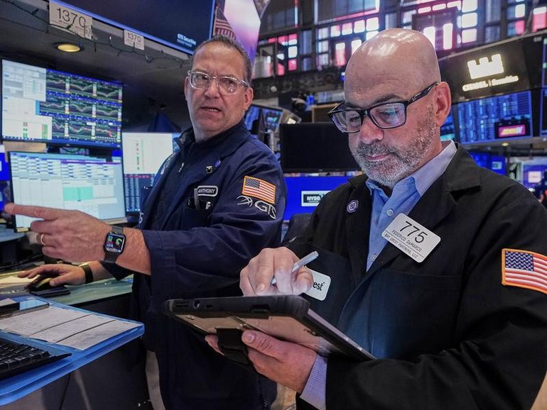Wall Street traders have priced in a 70 per cent chance of a rate hike before the end of the year. (AP PHOTO)