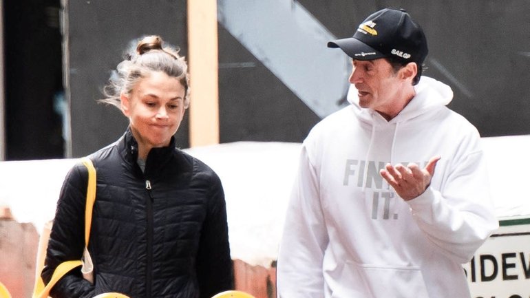 Hugh Jackman and Sutton Foster have been spotted looking ‘unusually tense’ as rumours circulate about the star’s ex-wife Deborra-Lee Furness requesting a meeting with the couple. 