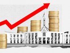 Economists from Australia’s biggest bank said interest rates could rise following the Budget, which will spend an extra $6.5 billion. 