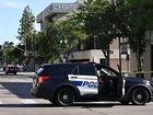 Police are trying to negotiate with a man who has taken a number of hostages at a California bank. (AP PHOTO)