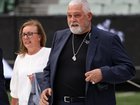 Underworld figure Mick Gatto and a woman have been arrested after detectives executed a search warrant at a property in Melbourne’s south-east.