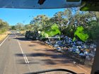 A truck carrying hundreds of bee hives has rolled over on a Queensland highway.
