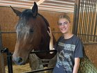 Horse Sully, pictured with owner Hailey Krahenbuhl, was one of those stabbed. 