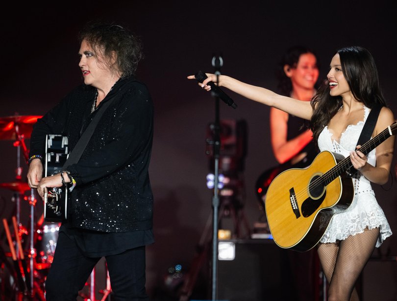 Olivia Rodrigo performs with Robert Smith of The Cure on the Pyramid stage during day five of Glastonbury festival 2025.