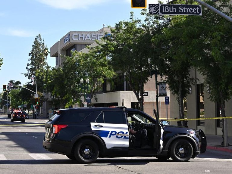 Police were trying to negotiate with the man after he took a number of hostages at a California bank. 