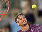 Flavio Cobolli celebrates his quarter-final victory over Felix Auger-Aliassime at the French Open. (AP PHOTO)