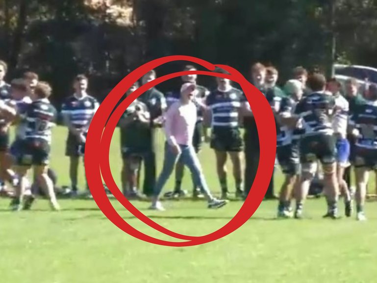 A parent has been sanctioned after storming onto the field during a heated on-field exchange at a junior sports match.