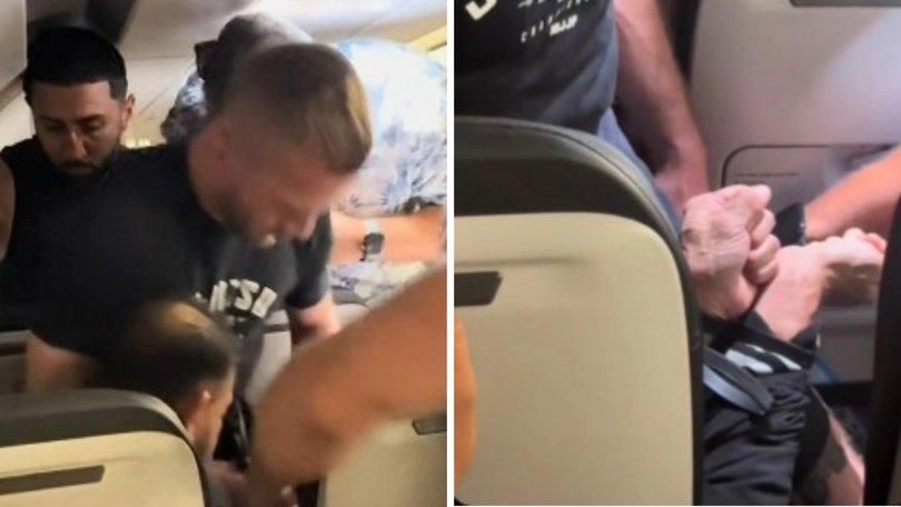 The unruly passenger had to be restrained with cable ties as the plane made an emergency landing.