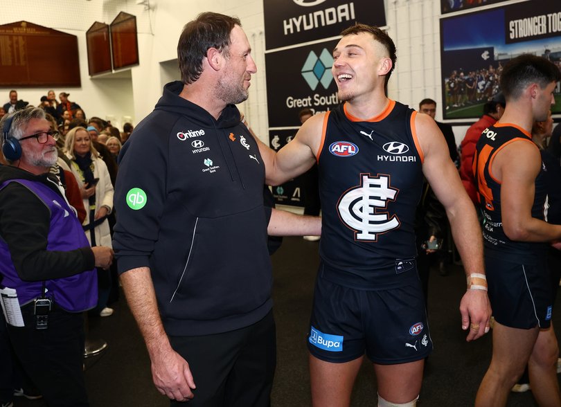 Josh Fraser and Patrick Cripps of the Blues celebrate.