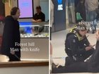 Shoppers have been forced to lock themselves inside stores, with a video showing a man with a large knife.