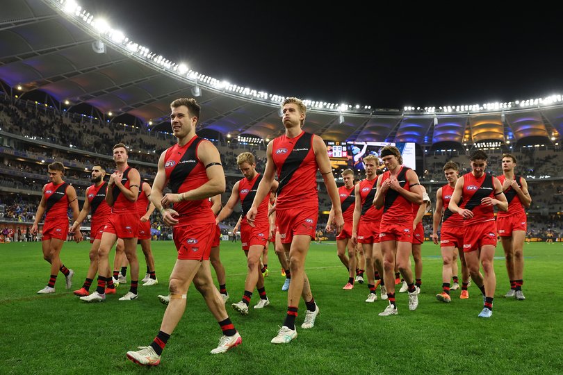 The Bombers look dejected.