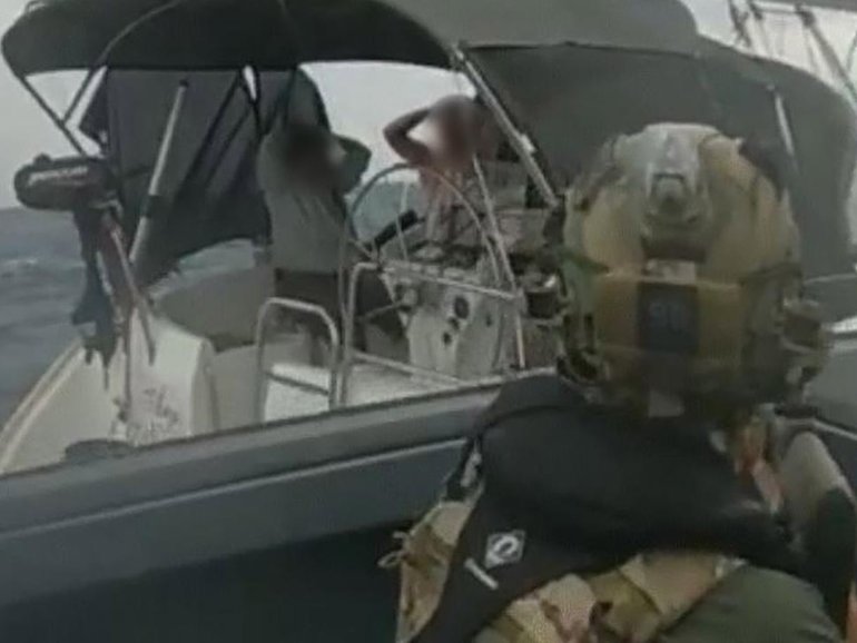 Tactical response group police intercepted three people in a boat off the coast of Exmouth. 