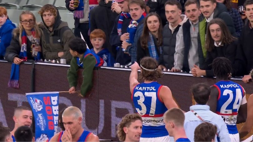 Michael Sellwood points out a fan who was heckling him from the crowd.