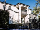 Police are hunting a gang of masked men after a 23-year-old suffered ‘life altering’ injuries in a violent raid on a luxury family home.