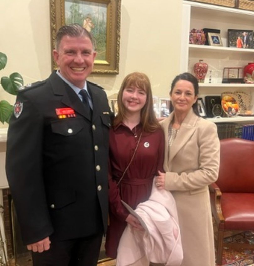 Johnson with his wife and daughter.