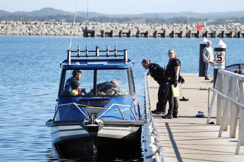 Police at Emu Point boatramp after a diver was bitten by a shark near Michaelmas Island.
