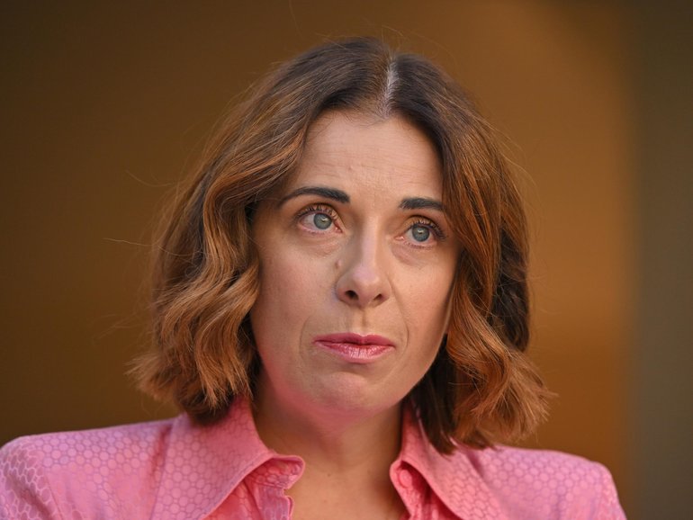 Minister for Communications Anika Wells speaks to the media during a press conference at Parliament House in Canberra, Tuesday, April 28, 2026. (AAP Image/Mick Tsikas) NO ARCHIVING, EDITORIAL USE ONLY MICK TSIKAS