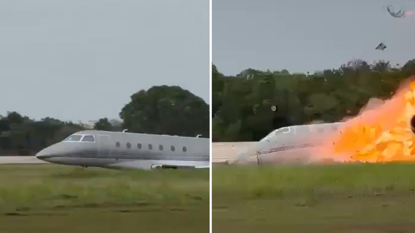 Dramatic video has captured the moment a private jet slid across the ground and exploded in flames.