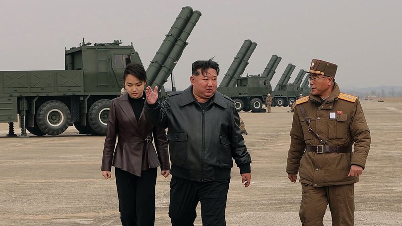 This picture taken on March 14, 2026 and released by North Korea's official Korean Central News Agency shows Kim Jong Un and his daughter Kim Ju Ae observing a military training exercise.