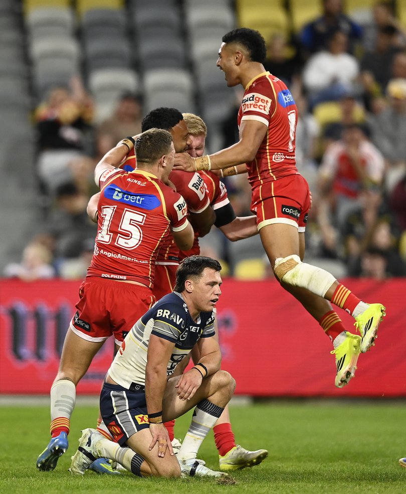 Thomas Fleger celebrates a try against the Cowboys.