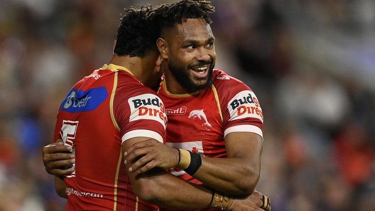 Selwyn Cobbo celebrates after scoring a try with Hamiso Tabuai-Fidow.