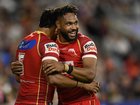 Selwyn Cobbo celebrates after scoring a try with Hamiso Tabuai-Fidow.
