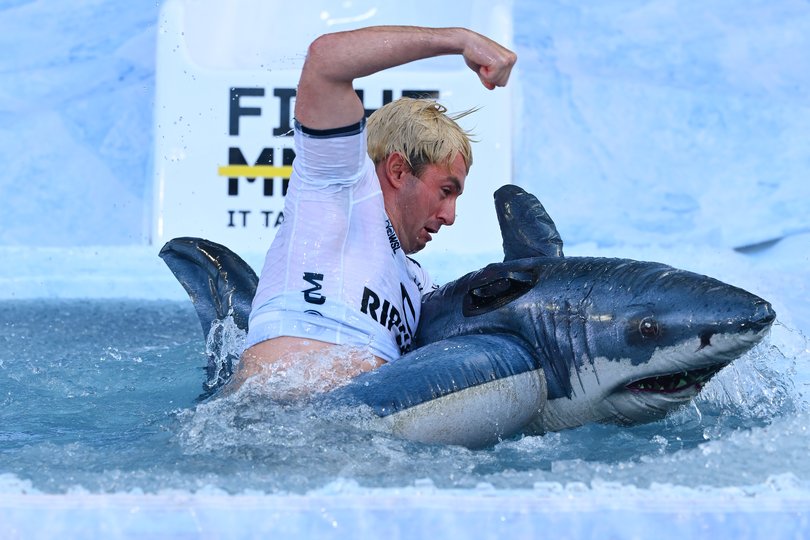 MELBOURNE, AUSTRALIA - JUNE 08: Cooper Woods goes down the slide as Mick Fanning for FightMND Big Freeze 12 ahead of the round 13 AFL match between Collingwood Magpies and Melbourne Demons at Melbourne Cricket Ground, on June 08, 2026, in Melbourne, Australia. (Photo by Quinn Rooney/Getty Images)